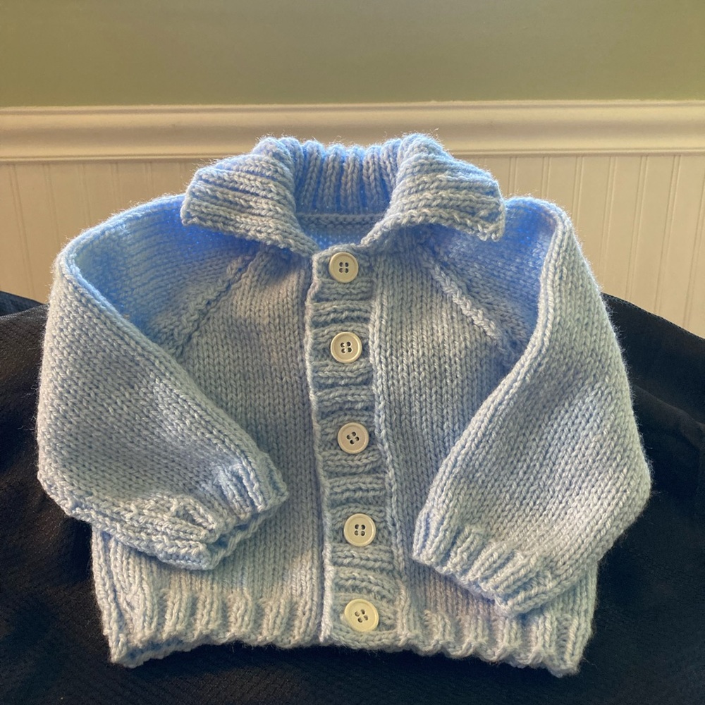 Brand new hand knitted baby sweater